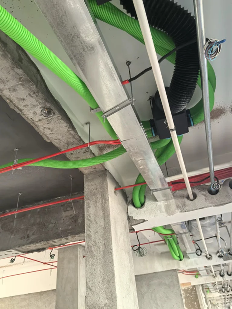 Real routes supported and coordinated around structural, HVAC, electrical and fire services.